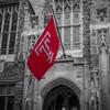 Temple flag in front of temple building.